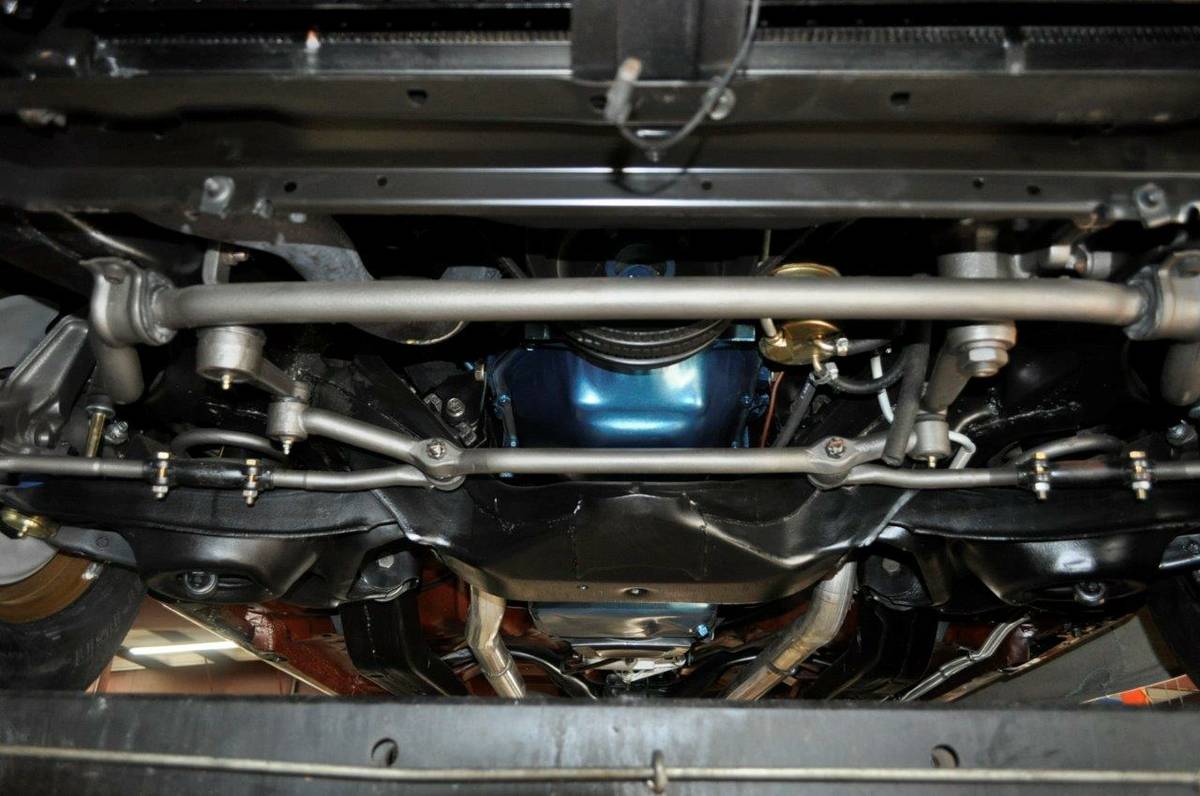 Underneath car, suspension system and air intake.